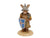 Bunnykins Gladiator is wearing a helmet and protective vest, he is holding a shield and fork.