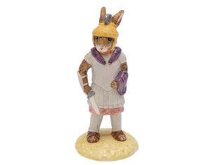 Wearing a yellow helmet, white tunic with purple scarf, carrying a sword.