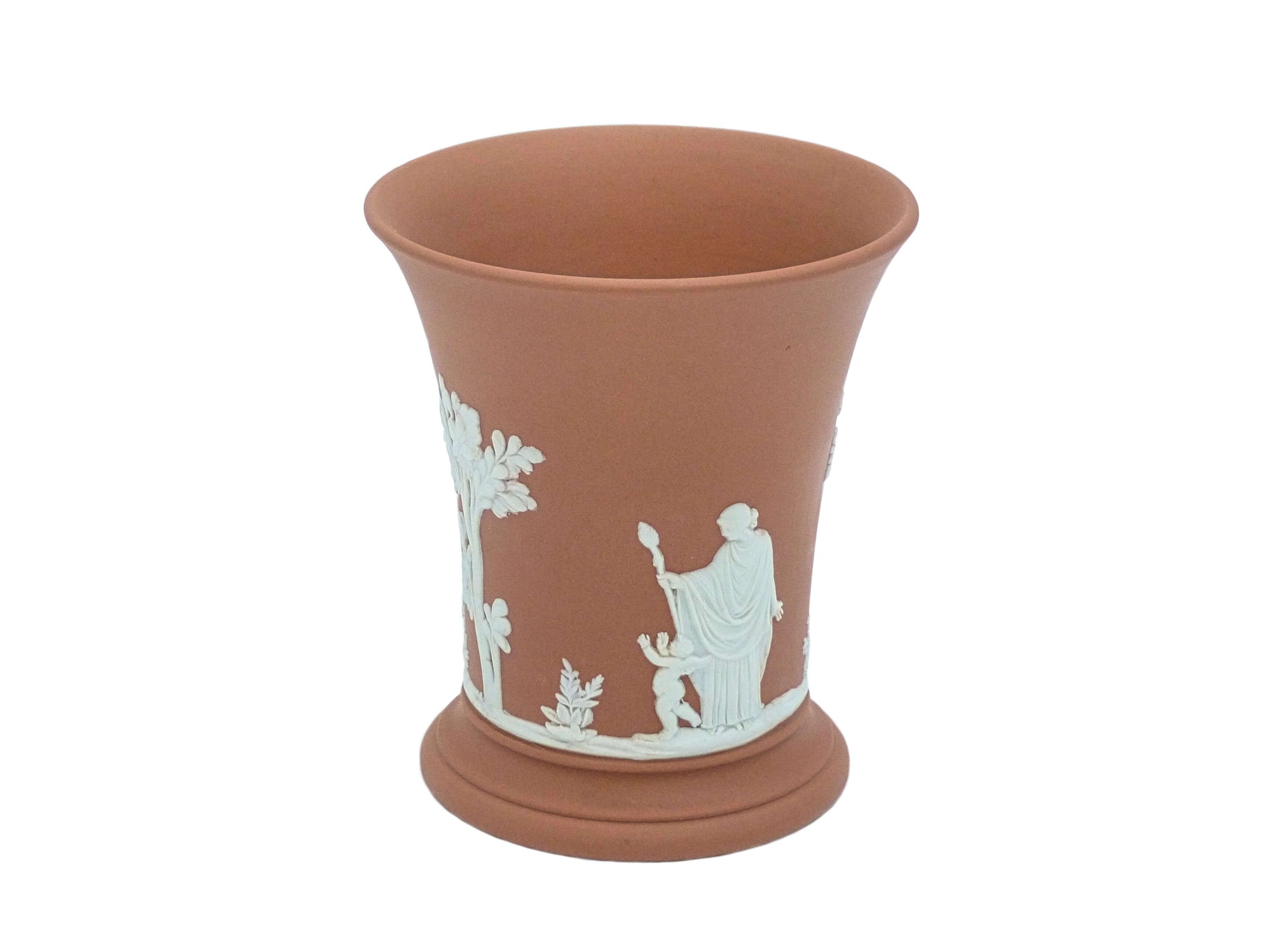 A small terracotta Wedgwood jasperware vase with white neoclassical designs around the body.