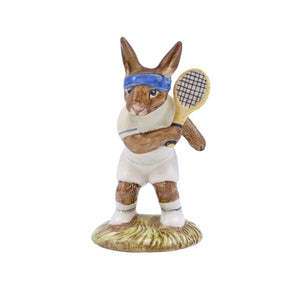 A bunny in white top and shorts, blue headband, with his racquet raised to hit the ball.