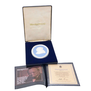 White on blue medallion featuring Sir Winston Churchill, in the original blue box.